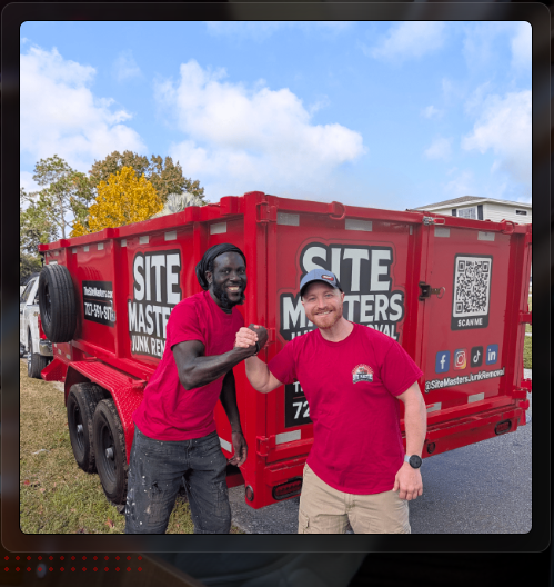 Site Masters owner Art and crew member in front of dump trailer - Tampa Bay fence removal team